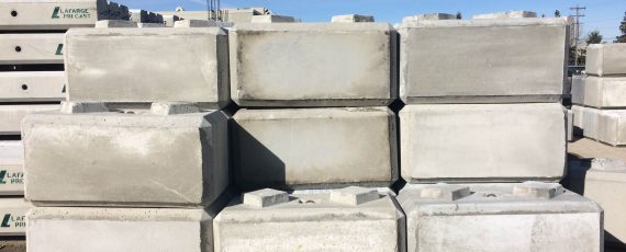 Precast concrete lock blocks stacked into a wall